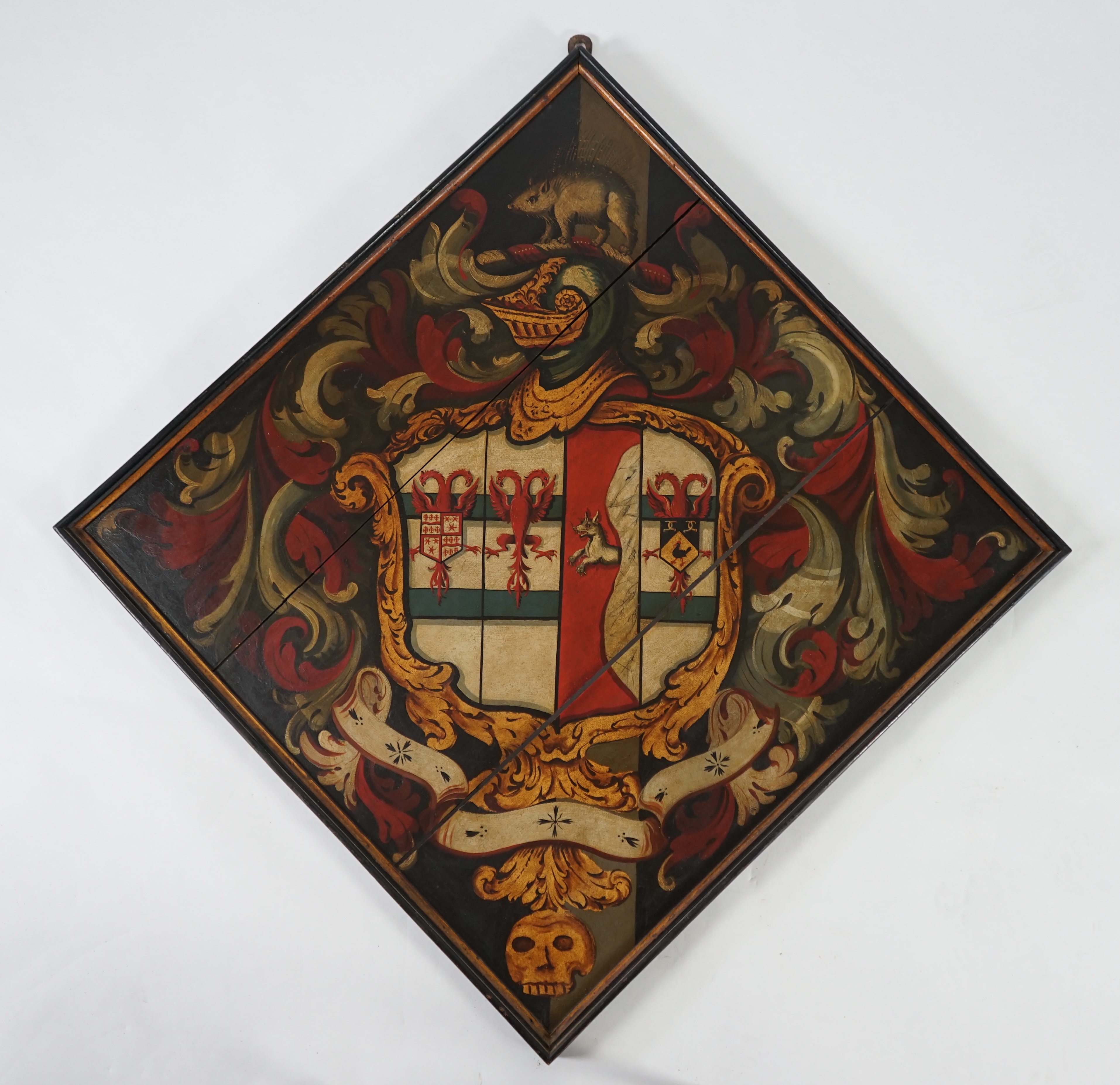 A late 18th / early 19th century oil on wooden panel hatchment